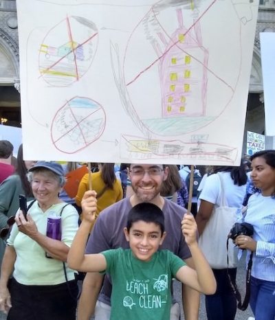 The author and his son at the Global Climate Strike in Hartford, Connecticut